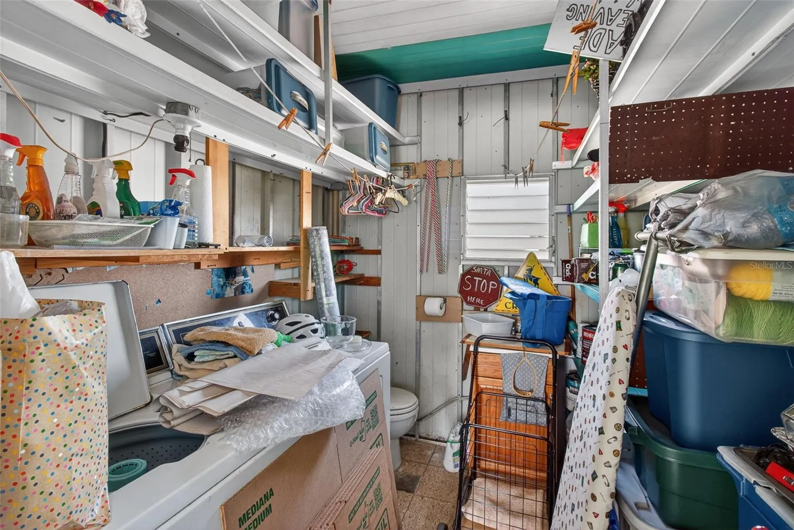Outside utility offers half bath washer and dryer stay