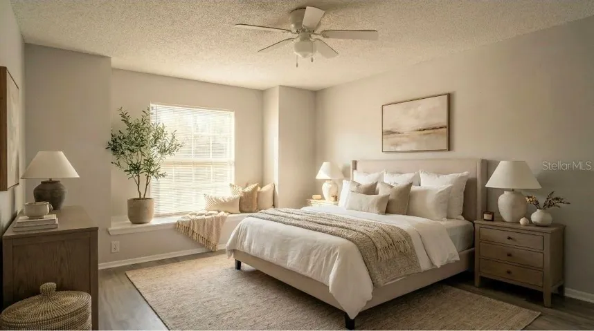 Primary bedroom on first floor staged