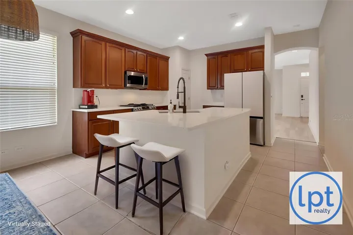 Virtually Staged adding stools to kitchen island