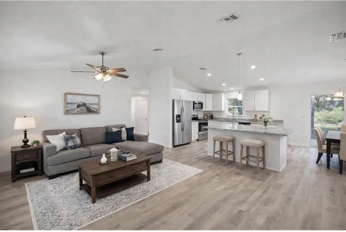 The home shown is the same property and is well maintained. Photos have been enhanced and virtually staged using artificial intelligence; furniture, décor, and enhancements are for illustrative purposes only, and actual conditions may vary