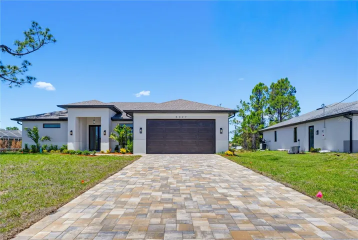 Front of home & Paver Driveway