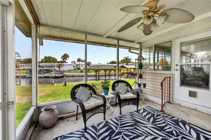 Covered screened porch with ceiling fan