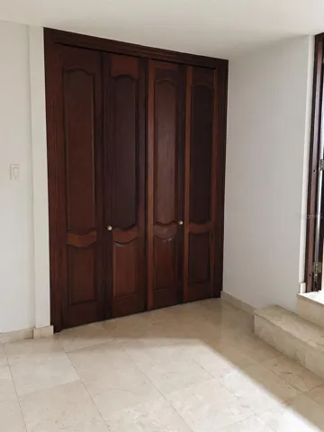 Cedar wood closets with custom-designed doors