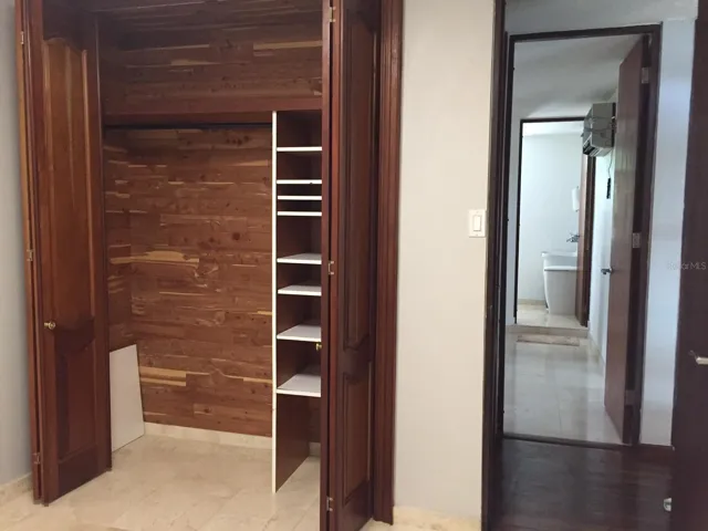 Cedar wood closets with custom-designed doors