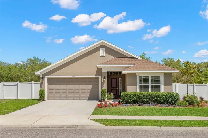 Clean lines, manicured landscaping, and a fully fenced backyard create standout curb appeal for this beautifully maintained 3-bedroom, 2-bath home.