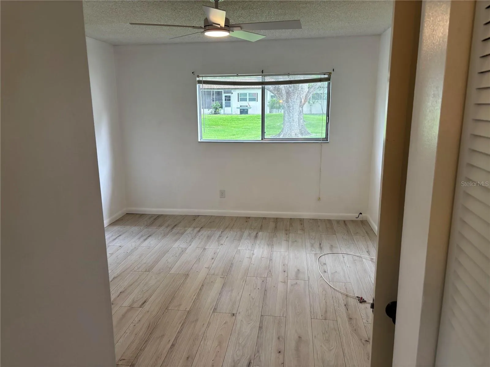 MASTER BED WITH NEW VINYL FLOORING