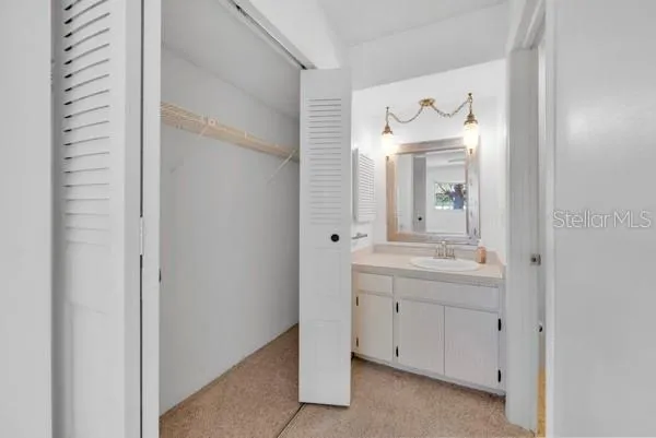 MASTER BATH VIEW WITH WALK IN DOORS OPEN