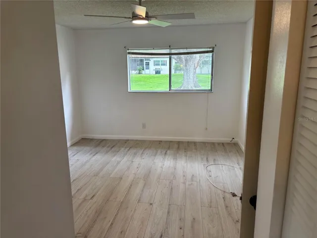 MASTER BED WITH NEW VINYL FLOORING