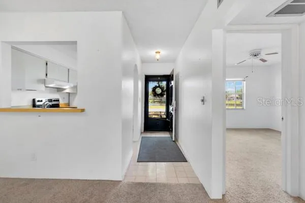 ENTRANCE VIEW WITH OPEN DOOR