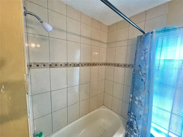 Tiled Bathoom Tub/Showwer in hall bathroom