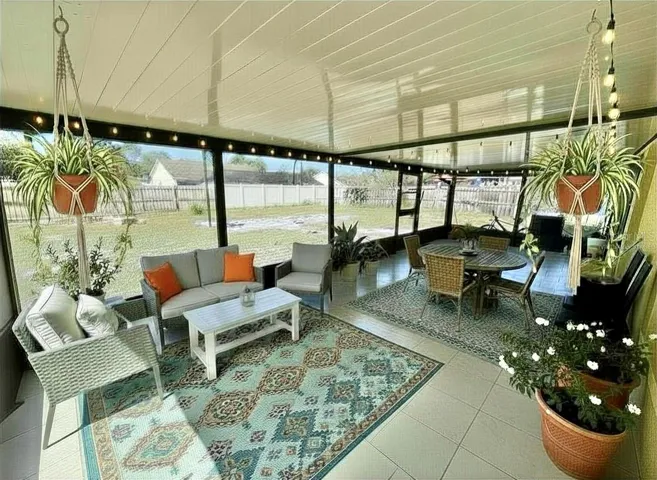 Virtually Staged. Extra large back porch!