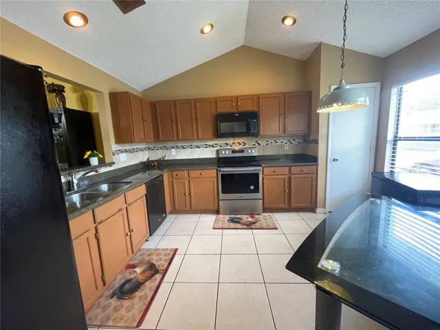 You're going to love this large kitchen with breakfast nook and Granite Countertops