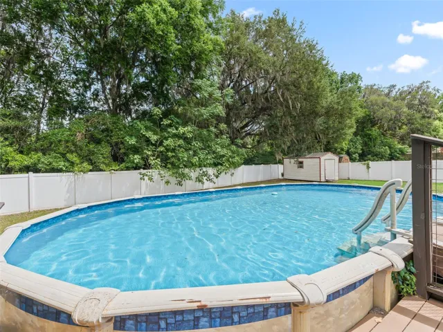 Above ground pool with deck