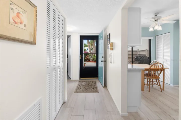 Front hallway and Kitchen.  Look at these floors!