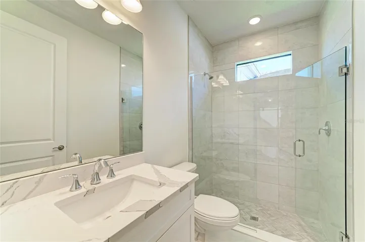 Secondary Bath upgraded tile and shower doors
