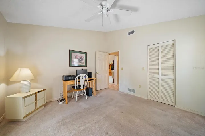 Pocket door off the living area makes this second bedroom and bath feel like a private suite!