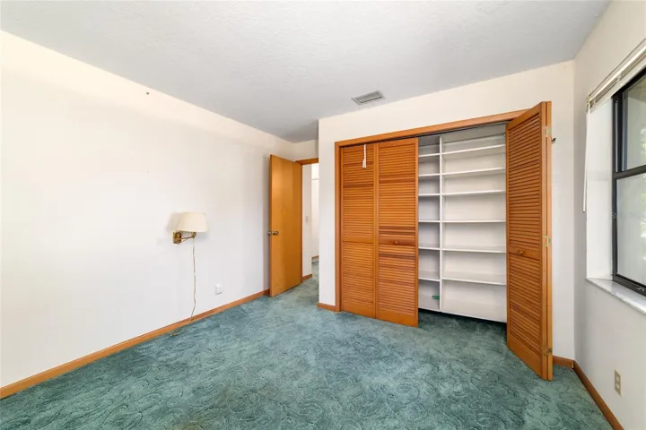 Bedroom 2 with closet system