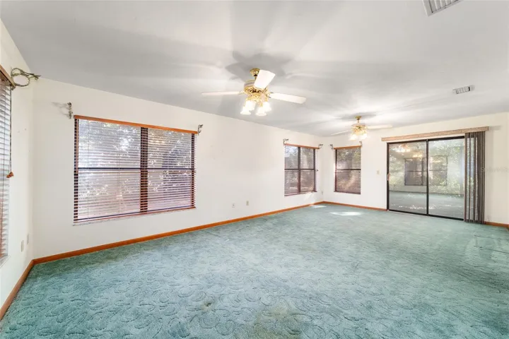 Sunroom overlooking backyard
