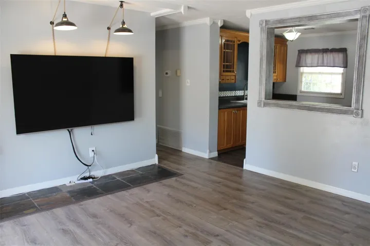 Living room comes with a mounted 75