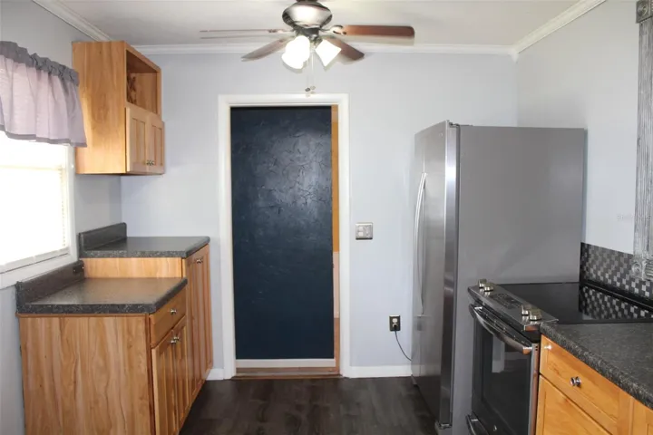 This door leads from the kitchen to the 18'x10.5' bonus room!