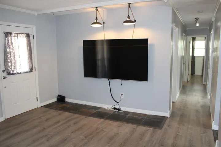 Luxury vinyl plank is upgraded through the hallway!