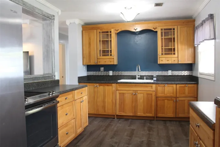 Beautiful spacious kitchen with plenty of storage and counter space.