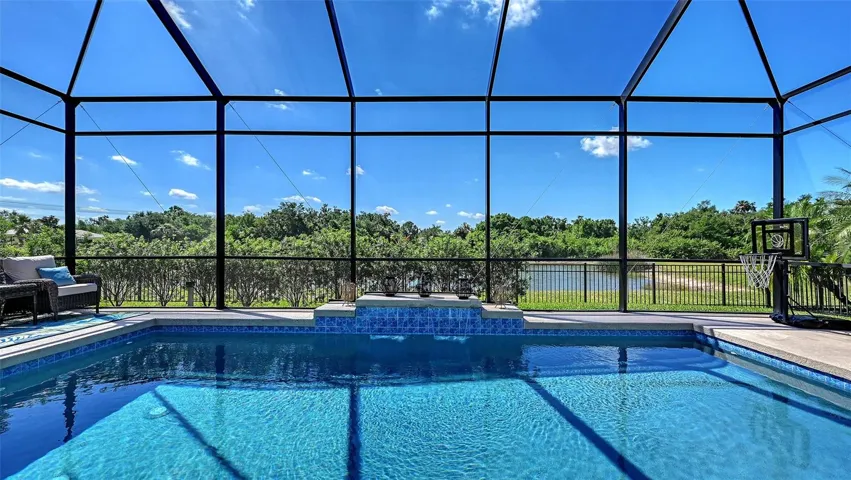 Heated Pool with pond view