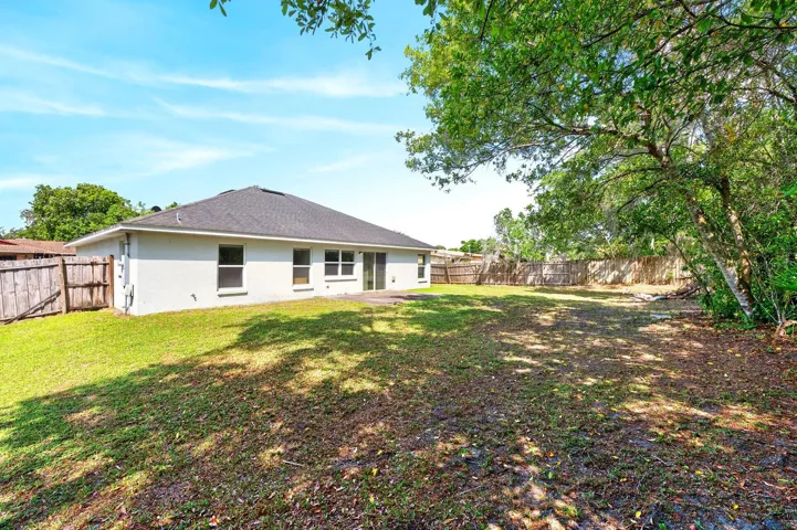Expansive fenced backyard.