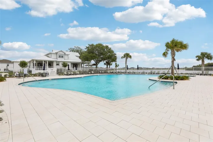 Life in Bridgewalk feels like a year-round vacation thanks to an impressive collection of RESORT-STYLE AMENITIES, including a sparkling pool, clubhouse, state-of-the-art fitness center, dog park, playground, sports courts, BBQ area, and community boat launch.