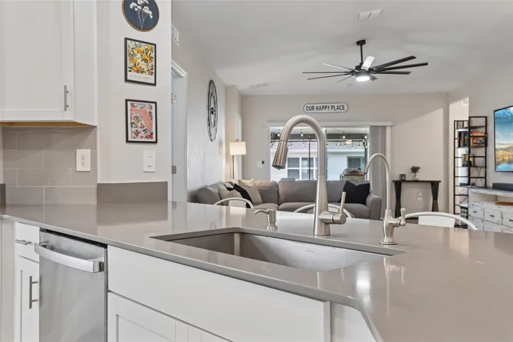 The breakfast bar provides extra prep space and room for counter-height seating.