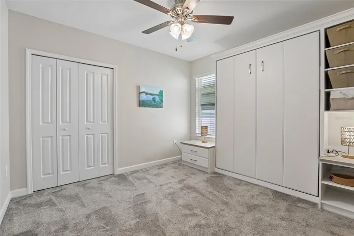 The Suite features a BUILT-IN MURPHY BED with shelving.