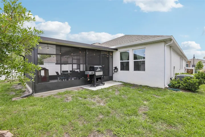 The spacious backyard is great for weekend gatherings and barbecues.