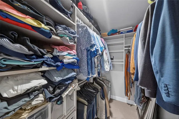 Walk-in closet in primary suite