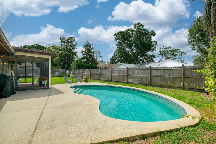 Paved deck around pool