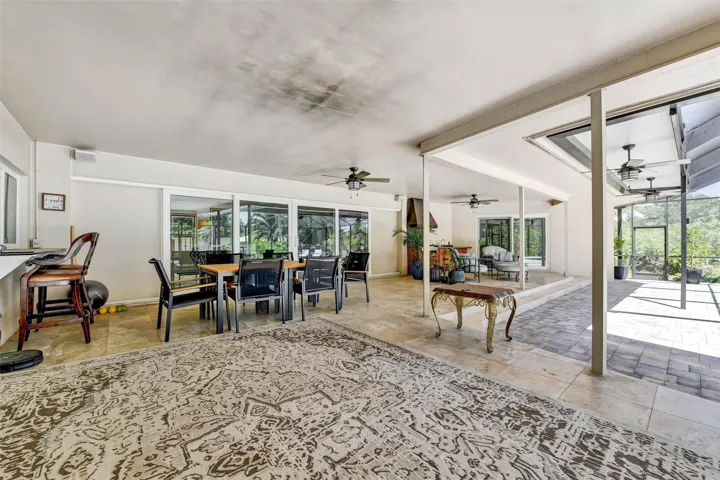 Covered living area off of pool