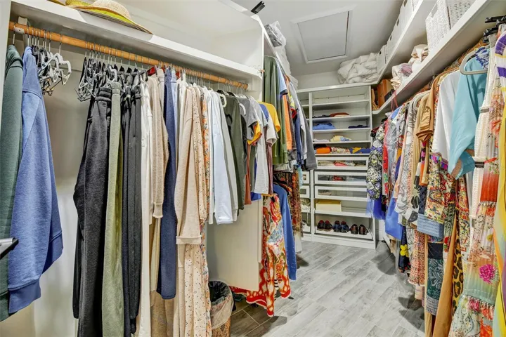 One of many huge walk in closets