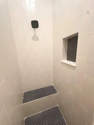 En suite bathroom shower.
