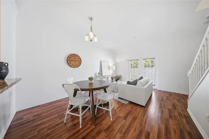 Laminate wood floors, new paint & a spacious living area
