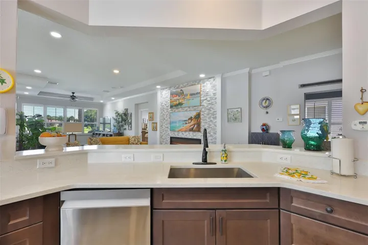 Even in the kitchen you have a view of the outside and water.
