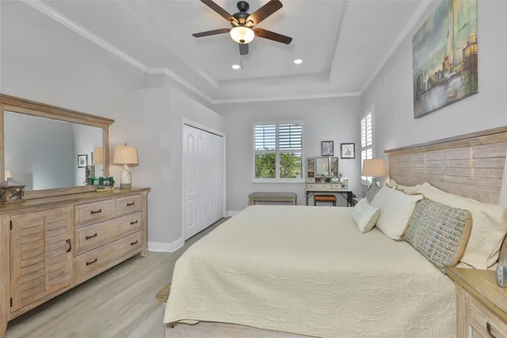 Multiple windows allow natural Florida sunshine into the room with a view of the water.