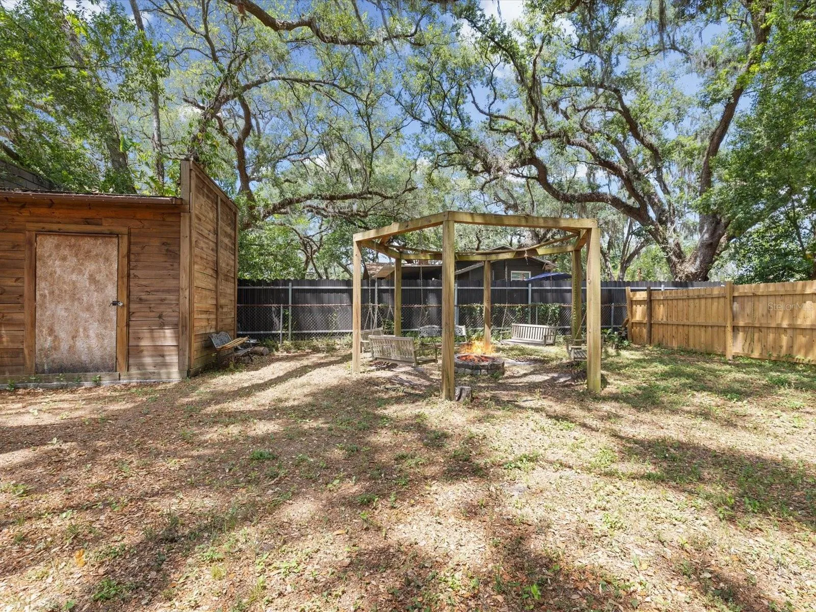 10,000sq ft. Double Lot-Fire pit area with swings