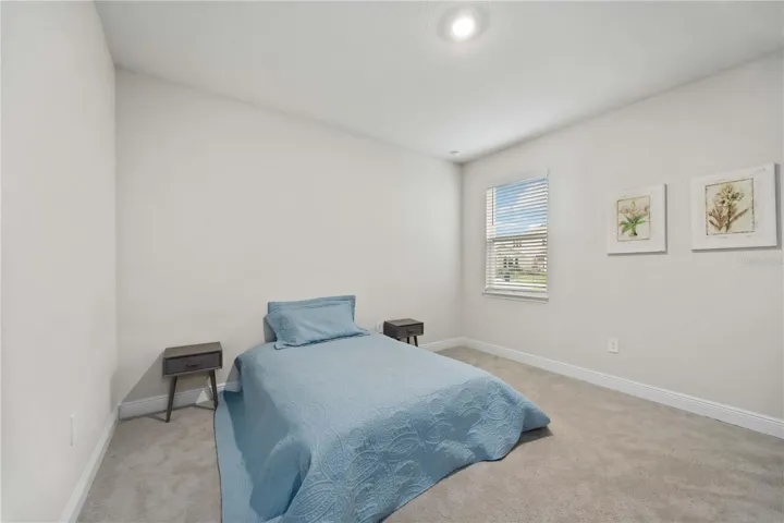 First Floor Bedroom with Ensuite Bath and Large Walkin Closet