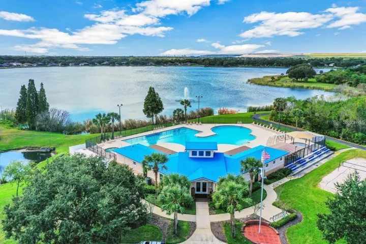 Lake St Charles Community Clubhouse sits on a 70-acre lake with a 2.1 mile walking trail around he community