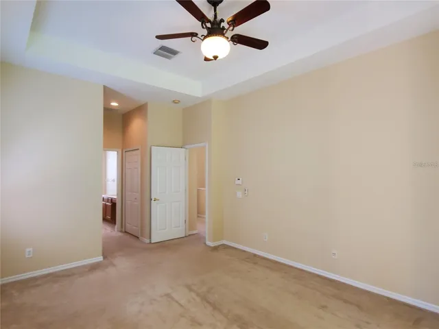 Primary Bedroom with Tray Ceiling