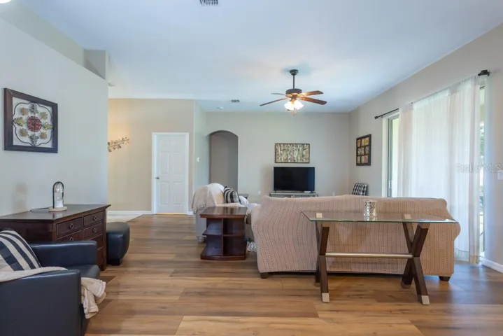 Sliders open to covered porch