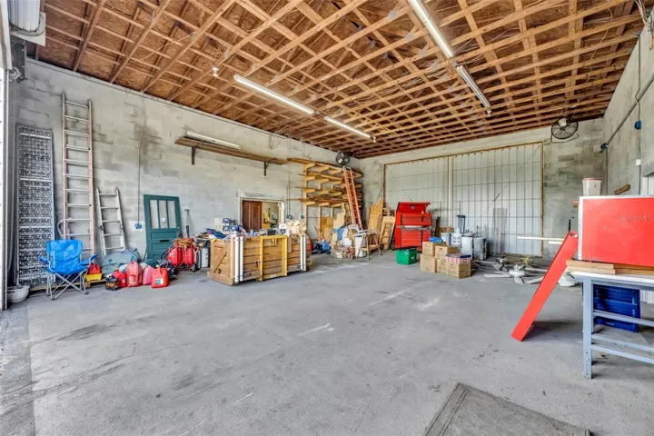 Center garage bay- 2-story ceilings for space to store an RV, large freight vehicle, boat, etc.