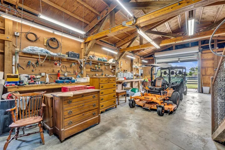 Loft barn with built-in workbench & tool storage