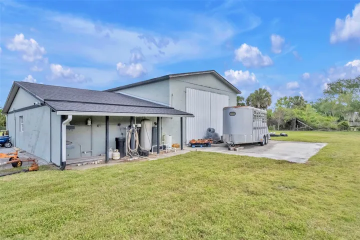 Rear of garage- concrete slab to park vehicles or trailers