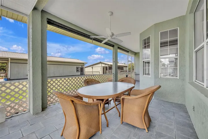 Screened rear patio off the main house family room