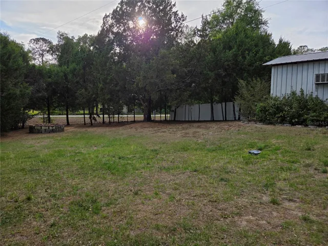 Back yard with firepit